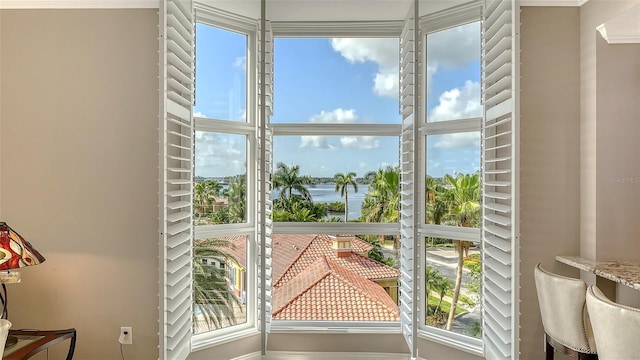 610 Riviera Dunes Way Unit 308, Palmetto, FL 34221 - doorway featuring a water view and plenty of natural light