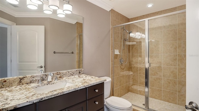 610 Riviera Dunes Way Unit 308, Palmetto, FL 34221 - bathroom featuring a shower stall, ornamental molding, toilet, and vanity