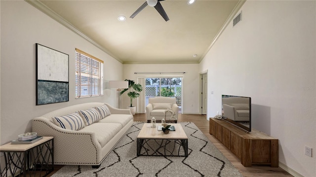 203 28th St W, Palmetto, FL 34221 - living room featuring ornamental molding, wood finished floors, a ceiling fan, baseboards, and recessed lighting