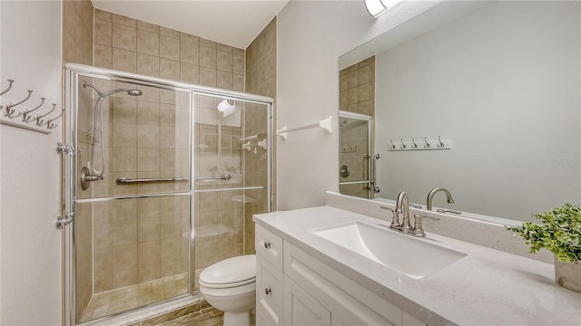203 28th St W, Palmetto, FL 34221 - full bathroom with a stall shower, toilet, and vanity