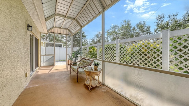 203 28th St W, Palmetto, FL 34221 - unfurnished sunroom featuring vaulted ceiling