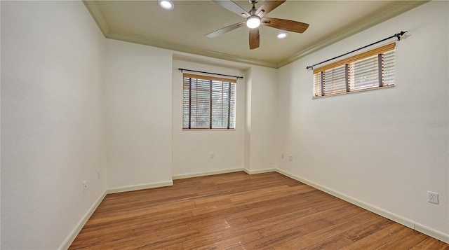 203 28th St W, Palmetto, FL 34221 - empty room featuring crown molding, a ceiling fan, light wood-style flooring, baseboards, and recessed lighting