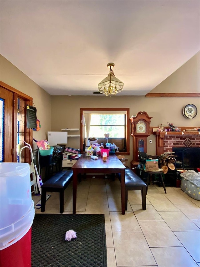 dining area featuring light tile patterned floors