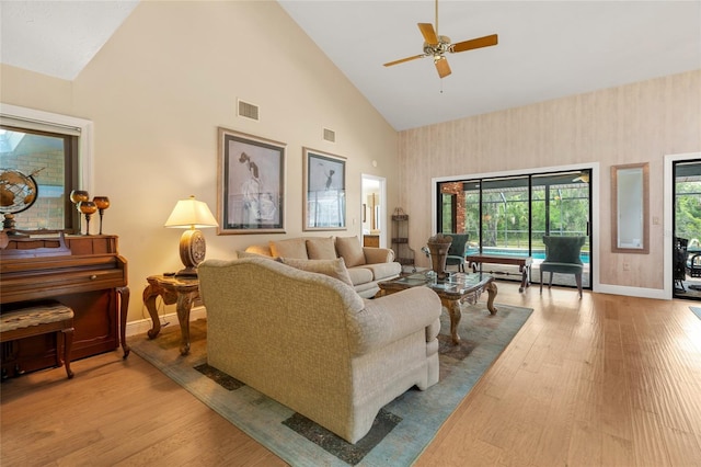 140 Cowpen Ln, Sarasota, FL 34240 - living area featuring high vaulted ceiling, baseboards, wood finished floors, and a ceiling fan