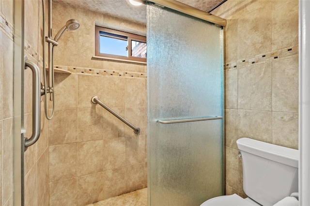 140 Cowpen Ln, Sarasota, FL 34240 - bathroom with a shower stall and toilet