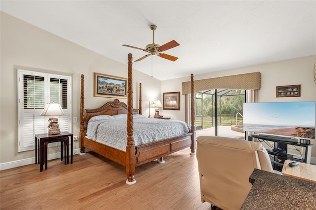 140 Cowpen Ln, Sarasota, FL 34240 - bedroom with lofted ceiling, access to outside, light wood-style floors, baseboards, and ceiling fan
