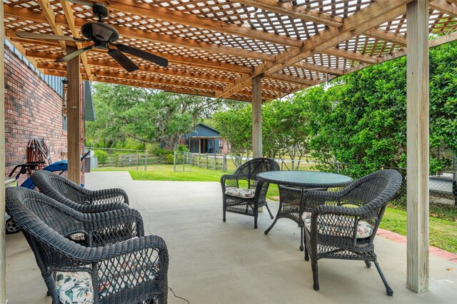 140 Cowpen Ln, Sarasota, FL 34240 - view of patio / terrace featuring a fenced backyard, a ceiling fan, a pergola, and outdoor dining area
