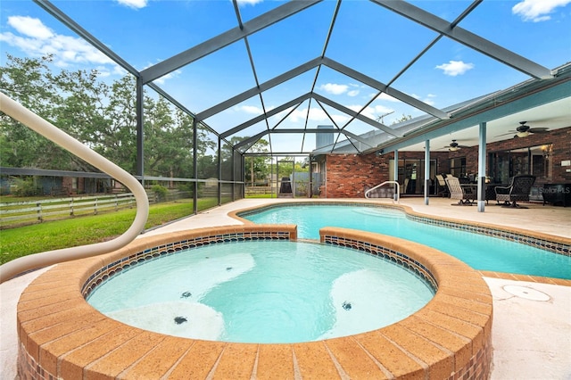 140 Cowpen Ln, Sarasota, FL 34240 - view of pool with a ceiling fan, a patio, a pool with connected hot tub, and glass enclosure