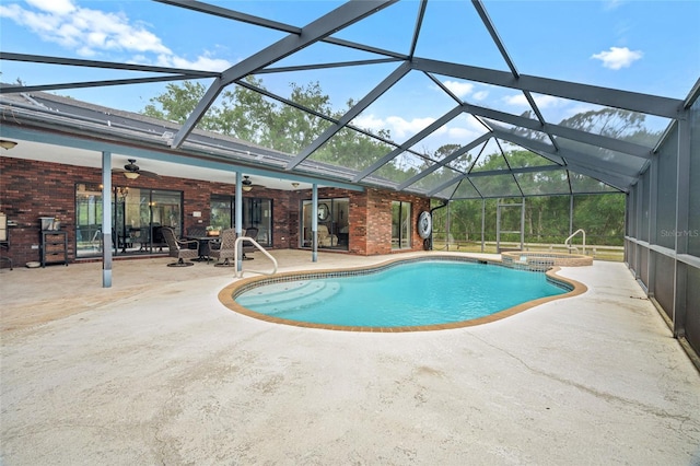 140 Cowpen Ln, Sarasota, FL 34240 - view of swimming pool with a ceiling fan, a patio, a pool with connected hot tub, and glass enclosure