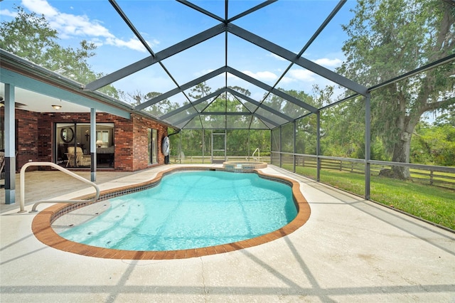 140 Cowpen Ln, Sarasota, FL 34240 - view of swimming pool featuring a patio, a pool with connected hot tub, and a lanai