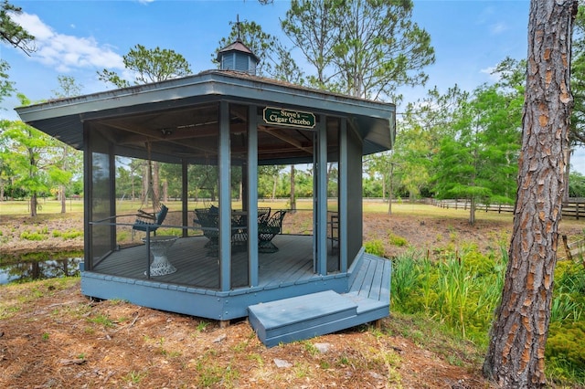 140 Cowpen Ln, Sarasota, FL 34240 - view of outdoor structure with a gazebo and fence