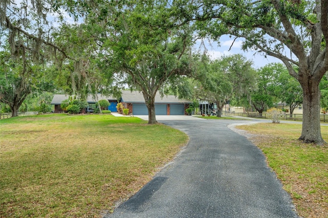 140 Cowpen Ln, Sarasota, FL 34240 - view of front of home with asphalt driveway