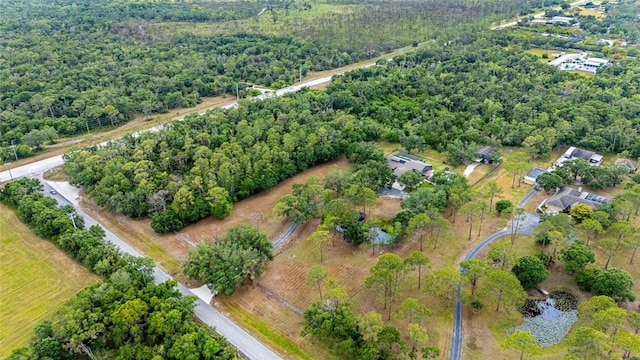 140 Cowpen Ln, Sarasota, FL 34240 - aerial overview of property's location featuring a heavily wooded area