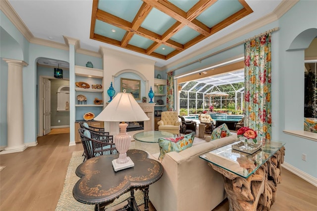 living room with decorative columns, wood finished floors, coffered ceiling, beam ceiling, and crown molding