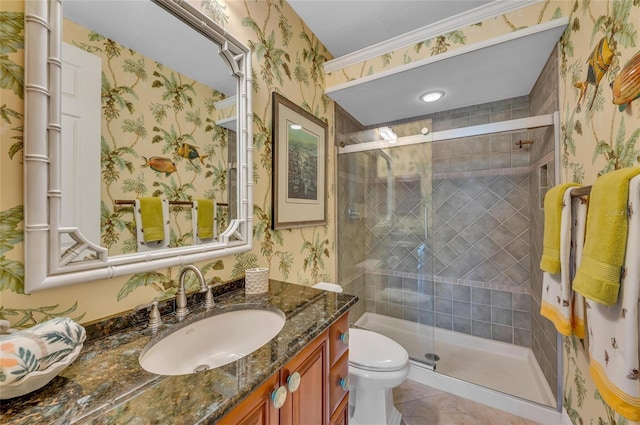 full bathroom featuring wallpapered walls, a stall shower, vanity, toilet, and tile patterned floors