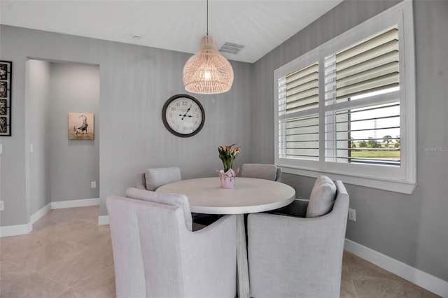 10414 Spring Tide Way, Parrish, FL 34219 - dining area featuring baseboards