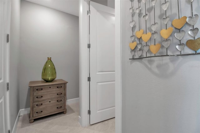 10414 Spring Tide Way, Parrish, FL 34219 - hall with baseboards and light tile patterned floors