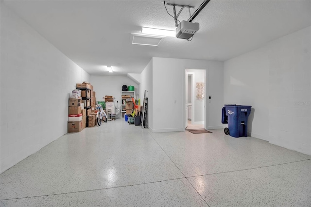 10414 Spring Tide Way, Parrish, FL 34219 - garage with a garage door opener and concrete block wall