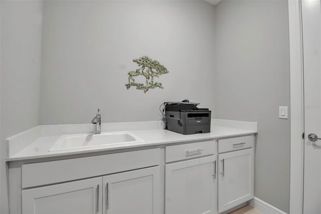 10414 Spring Tide Way, Parrish, FL 34219 - laundry area featuring a sink
