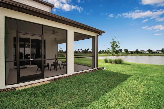 10414 Spring Tide Way, Parrish, FL 34219 - view of grassy yard featuring a water view and a sunroom
