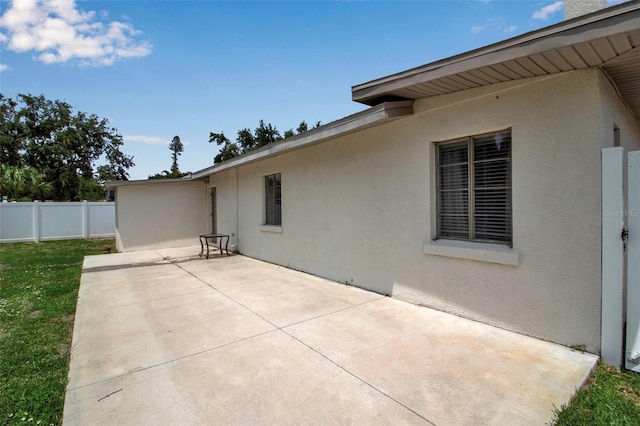 view of patio with fence