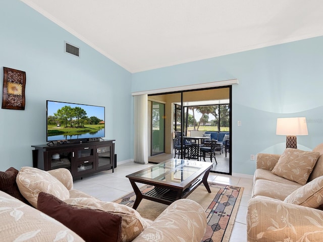 living area featuring light tile patterned floors, ornamental molding, baseboards, and high vaulted ceiling