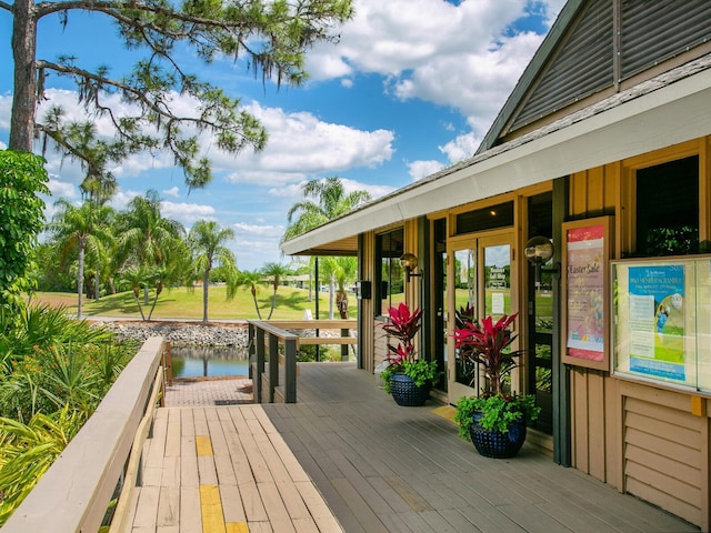 deck featuring a water view