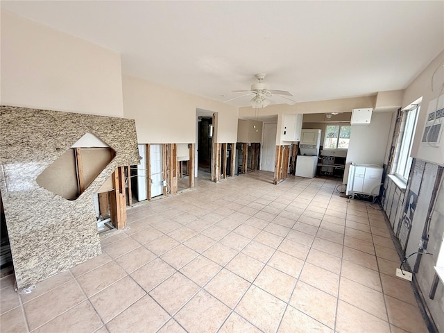 1726 8th St, Sarasota, FL 34236 - unfurnished living room with light tile patterned floors and a ceiling fan