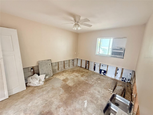 1726 8th St, Sarasota, FL 34236 - empty room with ceiling fan, cooling unit, and concrete floors