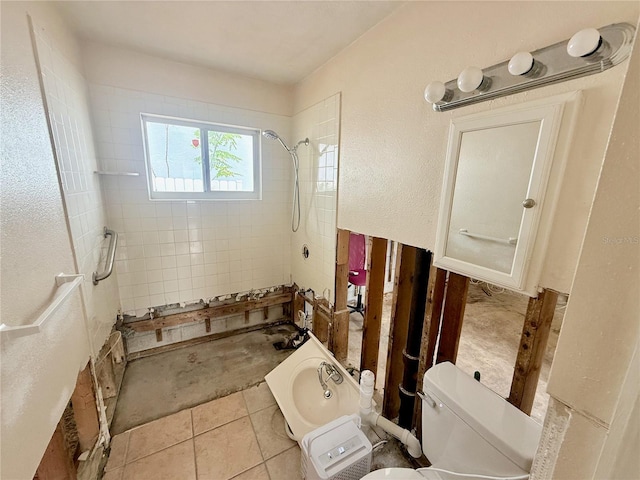 1726 8th St, Sarasota, FL 34236 - full bathroom with a shower stall, toilet, and tile patterned floors