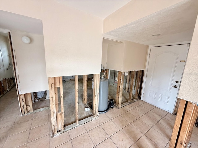 1726 8th St, Sarasota, FL 34236 - stairs featuring tile patterned floors and water heater