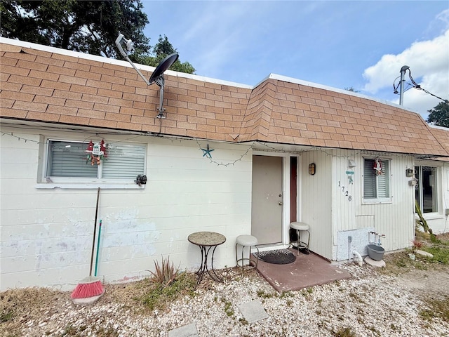 1726 8th St, Sarasota, FL 34236 - back of property with a shingled roof