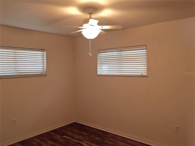 1726 8th St, Sarasota, FL 34236 - unfurnished room featuring a ceiling fan, dark wood-style flooring, and baseboards