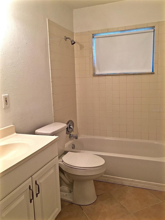 1726 8th St, Sarasota, FL 34236 - full bath with a textured wall, tile patterned floors, shower / tub combination, vanity, and toilet