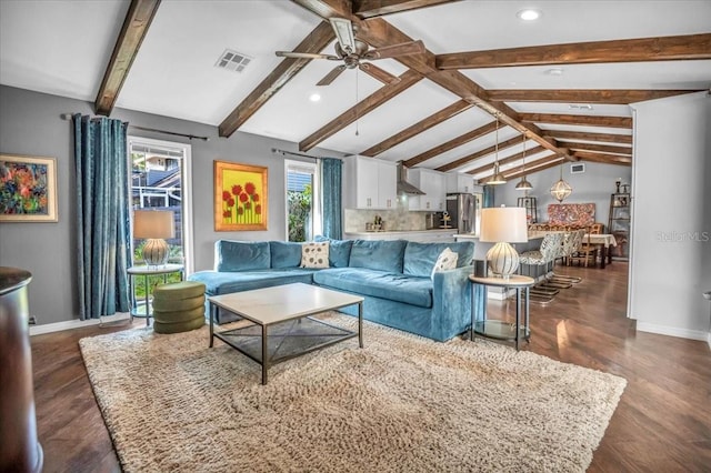 living area with plenty of natural light, dark wood-type flooring, baseboards, and recessed lighting
