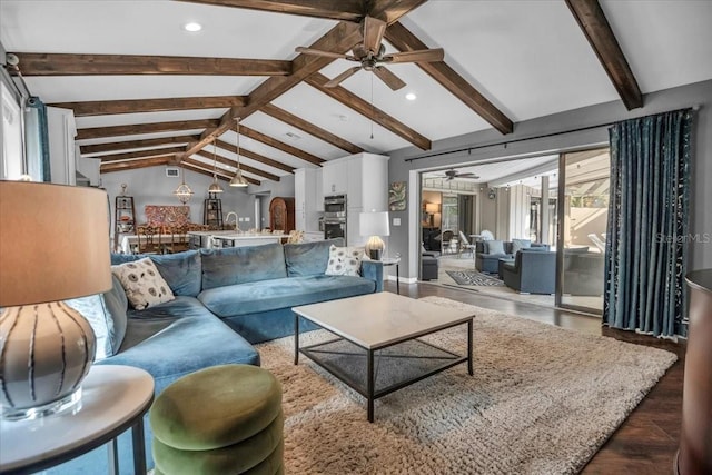 living area with ceiling fan and recessed lighting