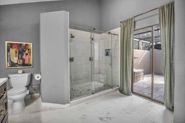 full bathroom featuring marble finish floors, a stall shower, toilet, and vanity