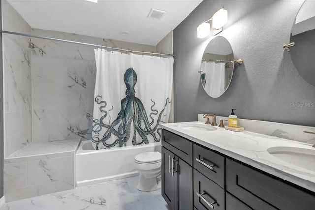 bathroom featuring marble look tile flooring, double vanity, shower / bath combo with shower curtain, and toilet