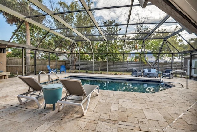 view of pool with a patio, a fenced backyard, and outdoor lounge area