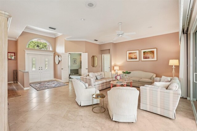 431 Fieldstone Dr, Venice, FL 34292 - living area with crown molding, ceiling fan, light tile patterned floors, and baseboards