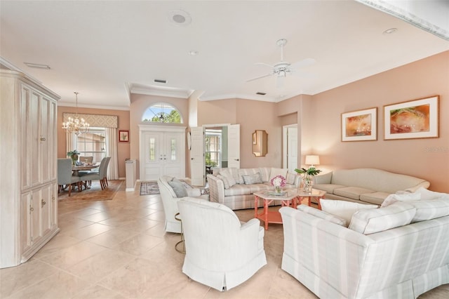 431 Fieldstone Dr, Venice, FL 34292 - living room featuring ornamental molding, a chandelier, ceiling fan, and light tile patterned flooring