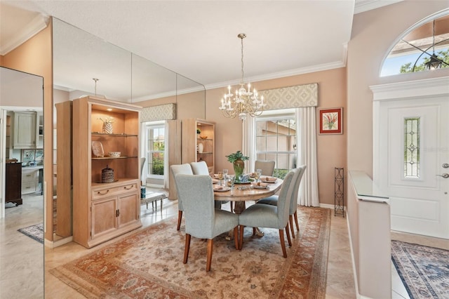 431 Fieldstone Dr, Venice, FL 34292 - dining space featuring ornamental molding, a chandelier, healthy amount of natural light, and baseboards