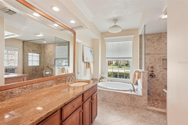 431 Fieldstone Dr, Venice, FL 34292 - bathroom featuring tiled shower, a garden tub, tile patterned flooring, vanity, and recessed lighting