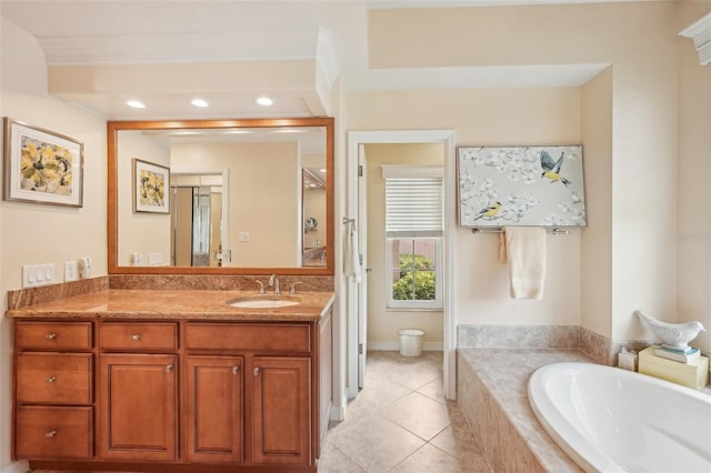 431 Fieldstone Dr, Venice, FL 34292 - full bathroom featuring a bath, vanity, tile patterned floors, and recessed lighting