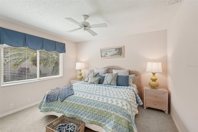 431 Fieldstone Dr, Venice, FL 34292 - bedroom featuring carpet floors, baseboards, a textured ceiling, and a ceiling fan