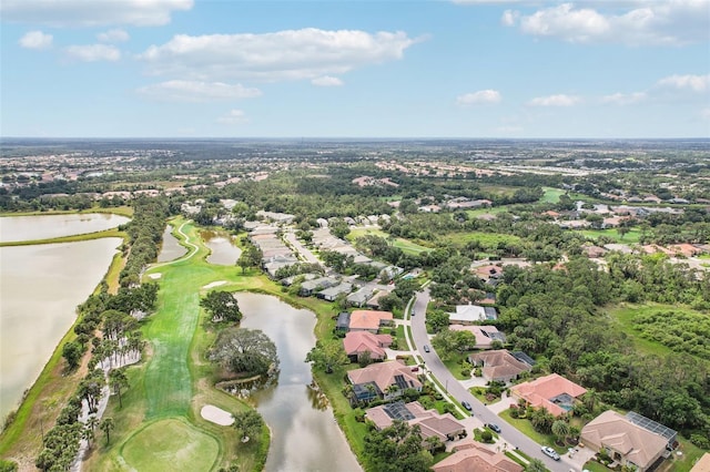 431 Fieldstone Dr, Venice, FL 34292 - aerial overview of property's location with nearby suburban area, a large body of water, a local golf course, and a tree filled landscape