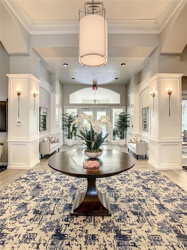 431 Fieldstone Dr, Venice, FL 34292 - lobby featuring a decorative wall and crown molding