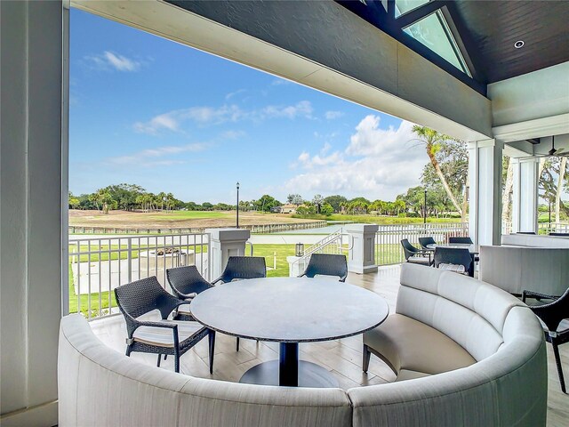 431 Fieldstone Dr, Venice, FL 34292 - view of patio featuring an outdoor living space, a water view, and golf course view