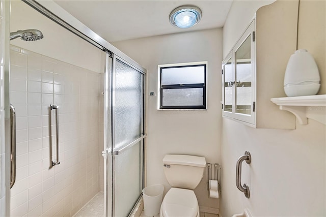 2607 Lancaster Dr Unit 35, Sun City Center, FL 33573 - bathroom with a shower stall and toilet