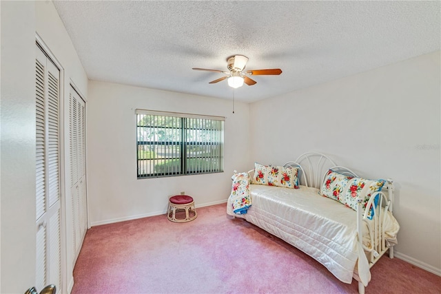 2607 Lancaster Dr Unit 35, Sun City Center, FL 33573 - bedroom featuring carpet, ceiling fan, a textured ceiling, and baseboards